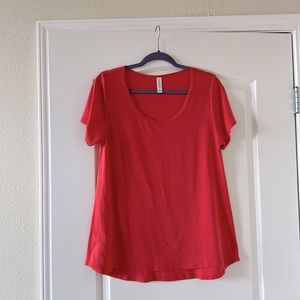 NWOT! Beautiful Lularoe Classic T shirt in orange color!